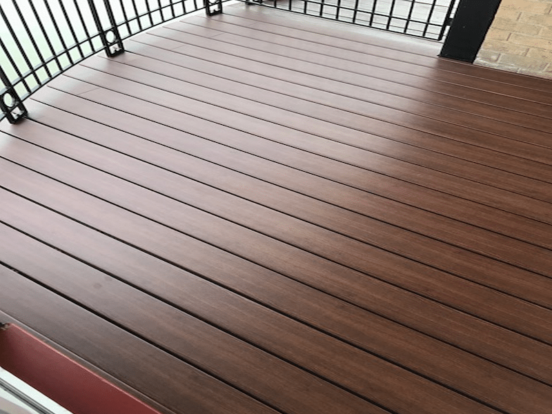 Installation of wood-plastic flooring on the balcony